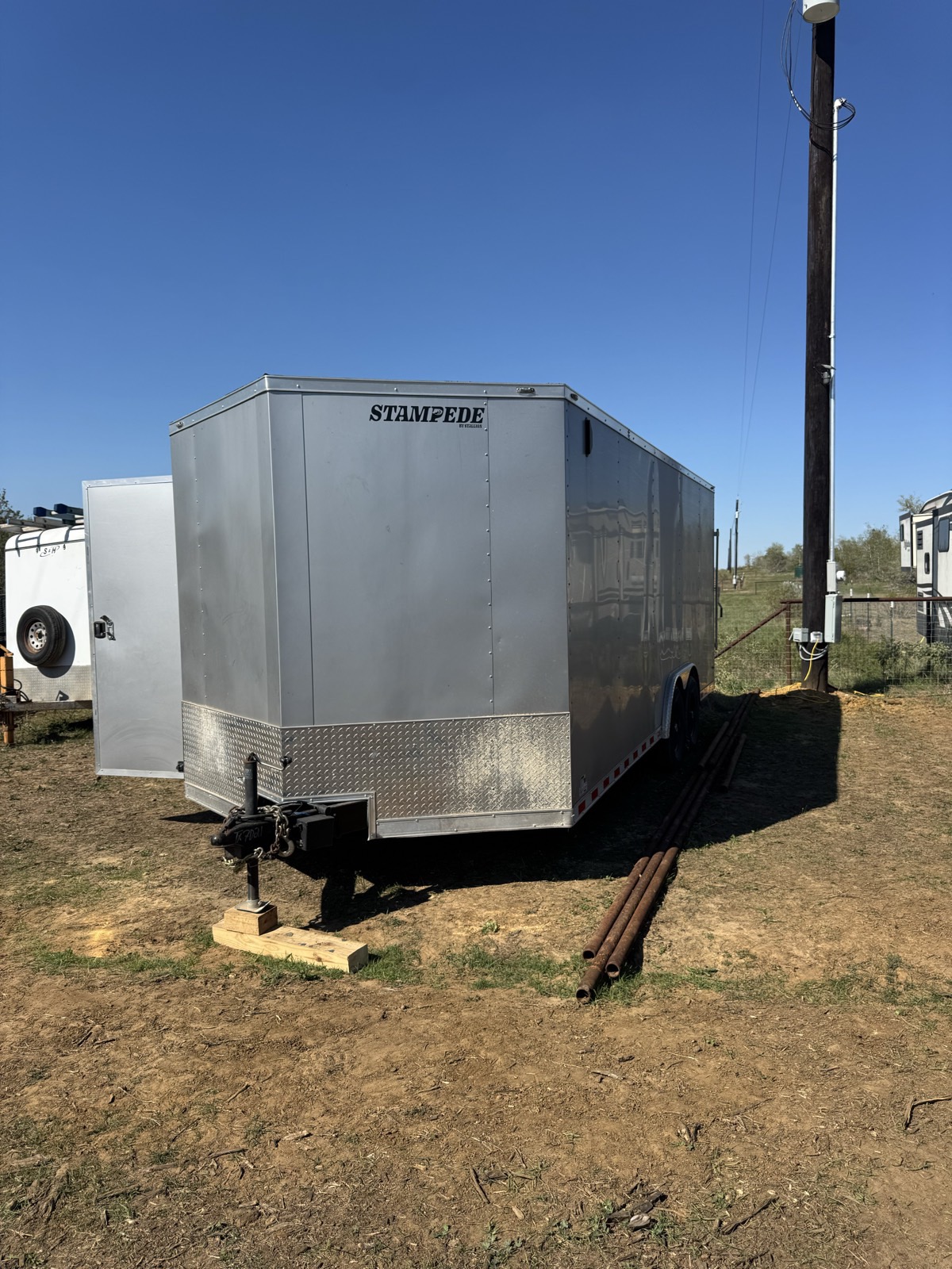 Front of the Stampede enclosed trailer with diamond plate stone guard